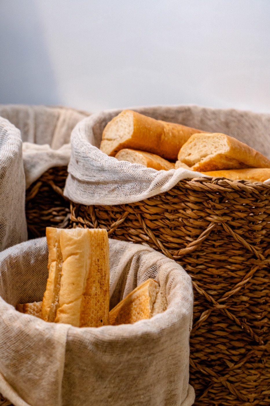 humphrey's counter — fresh baguettes in linen baskets
