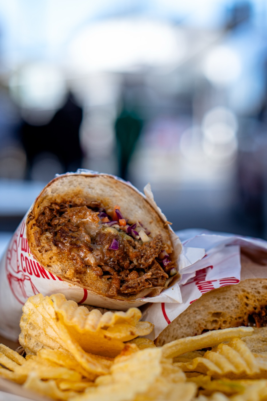 humphrey's counter — sandwich and chips in a branded wrap